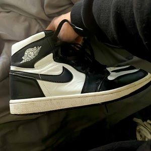 Black and white jordan 1.